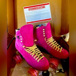 Super fun and cute Moxi hot pink sued Roller skates.